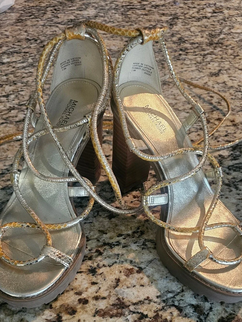 Michael Kors Vero Lug Platform Sandals in a metallic gold finish. Size 7.5